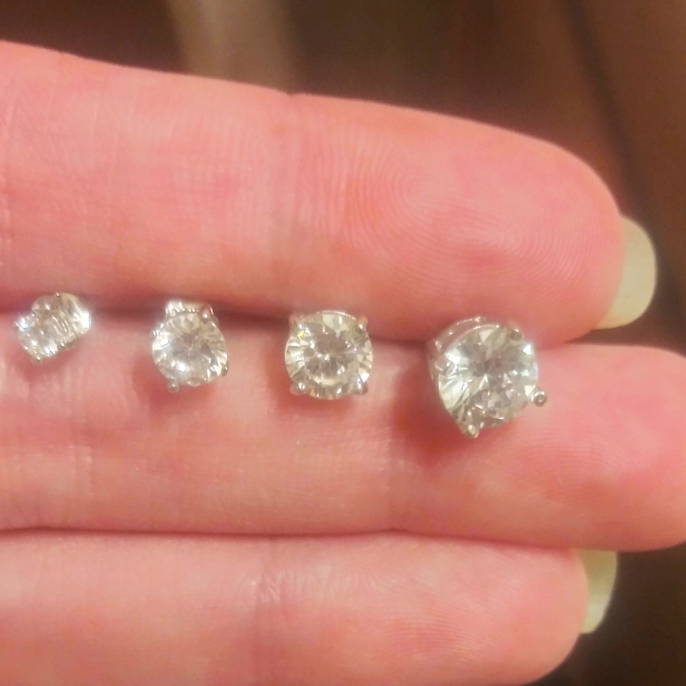 Sold! 4 pairs of diamond earrings